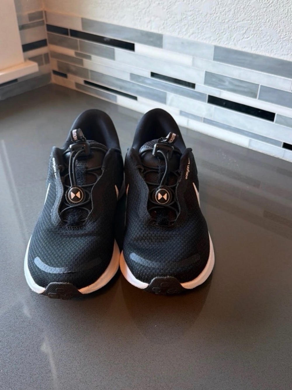 Nike Women’s Black and White Slip-On Athletic sneakers